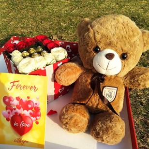 Chocolate and rose gift box with teddy and greeting card