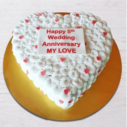 Flowery heart shape anniversary cake
