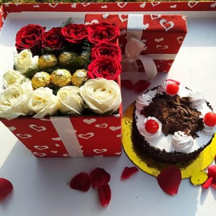 Cake with rose and ferrero rocher in gift box