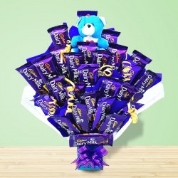 Teddy and dairy milk chocolates arrangement