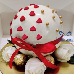 Designer white chocolate round shape pinata hammer cake