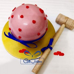 Designer round shape pinata hammer cake