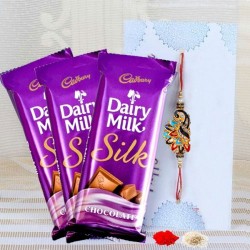 Dairy milk silk chocolates with rakhi and roli chawal Dairy milk silk chocolates with rakhi and roli chawal