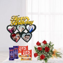 Happy birthday frame with flowers and chocolates