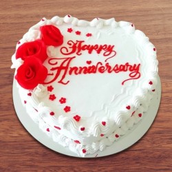 Heart shape happy anniversary cake