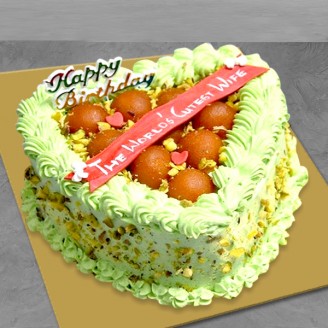 Kesar pista cake for wife with gulab jamun topping Online Cake Delivery Delivery Jaipur, Rajasthan
