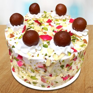 Kesar pista cake with gulam jamun topping Online Cake Delivery Delivery Jaipur, Rajasthan