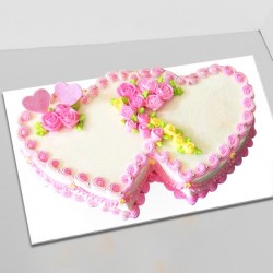 Double heart shape cake with flower design on top