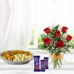 Dry fruit tray with chocolates and flowers